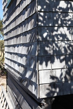Installers just brought the sidewall shingles to the corner leaving the seam open. These corners will have to be repaired soon to ward off weather intrusion.