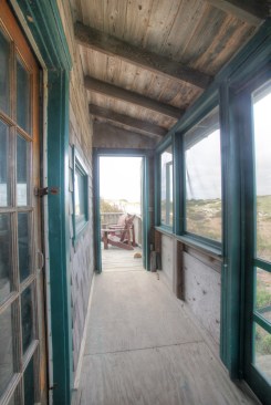 A narrow porch wraps the north side of the shack. Too small for sitting, it serves to shade and ventilate the main part of the shack.
