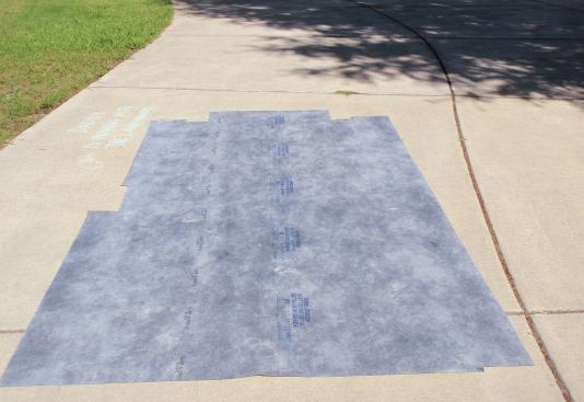 In this case, the membrane was marked with the curl facing up, so the author left the sheet out in the warm sun for 15 minutes to let it relax.