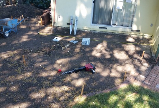 Suitable for freestanding decks in all climates, the Oz-Deck foundation system consists of metal deck plates and post anchors that are installed with a jackhammer.