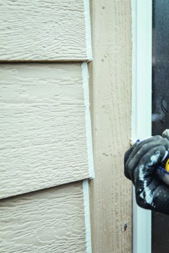 If the wood needs to acclimate, or if the weather is wet, the author will install the siding first and caulk the gaps later.