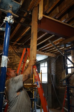 The beam slides into the pocket.