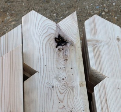 Bark pockets often occur when bark gets trapped by the tree’s growth at the crotch of a tree, evident here by the grain pattern of the center board.