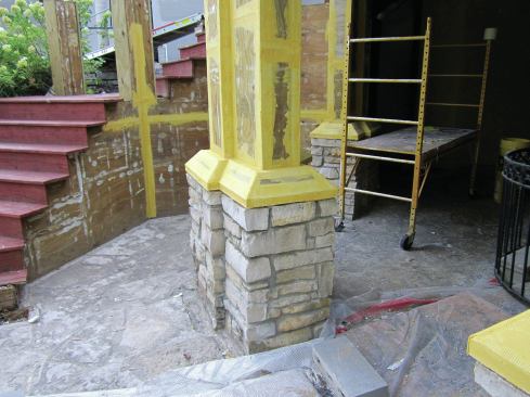 Mesh and sealant should be applied to all inside and outside corners. A brush can be used to work the membrane into tight spots.