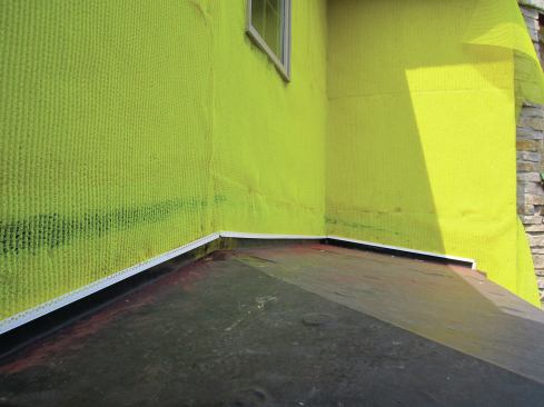 The rainscreen forms a three-dimensional separation between the WRB and the base panels that will be installed over it.