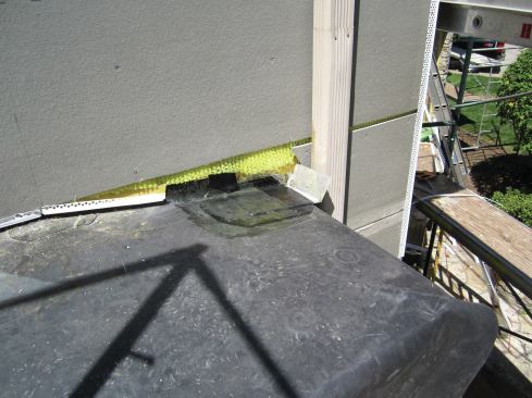 Horizontal control joints are typically placed between floors along the second- (and third-) floor band joists.