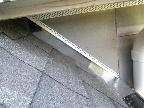 The base panel should finish out at least 2 inches above a paved surface or above a sloped roof.