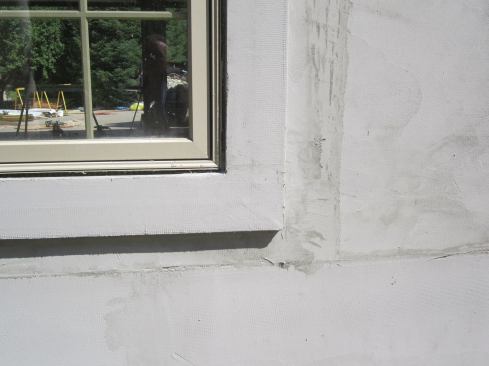 The foam trim then gets a base coat. The channel between the foam trim and the window is later sealed with backer rod and caulk. 