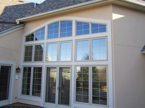 After the latex acrylic is applied, it is worked with a trowel to achieve the desired texture and finish.