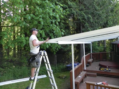 The outermost T-bars are fitted with side fascia trim.