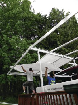 Acrylic roof panels are light, but should be handled by a couple of workers to prevent damage.