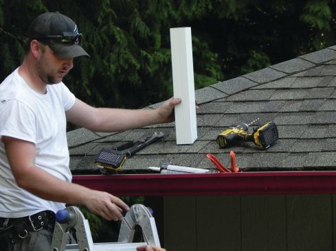 One end of the ridge beam supporting the patio cover’s gable roof will be connected to this short post section, which fits over the post-bottom shoe.