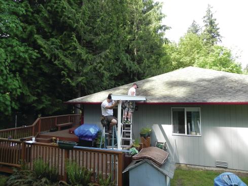 Because the cover section that will be supported by this beam will drain into a gutter, it has been slightly sloped back toward the house.