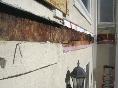 Once the EIFS cladding was cut away, moisture damage to the sheathing was evident.
