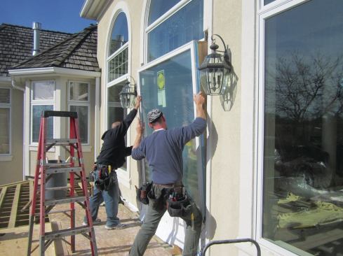 The project included replacing the original French door leading out onto the deck with a fixed window.