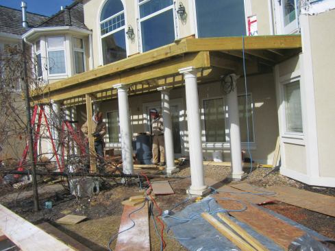 The lower columns were installed after the deck was framed.