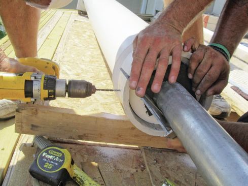 Workers added additional steel to the upper columns to provide a solid attachment point for a pergola and to resist both uplift and lateral movement.