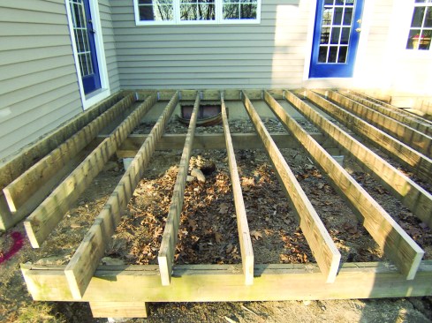 Figure 1. Still sound, the old joists needed only to have their tops planed flat in order to be reused.