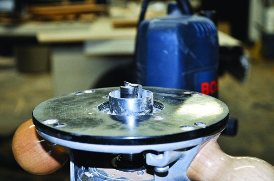Figure 11. Guide bushings ride on templates, guiding straight bits for cuts such as mortises. 