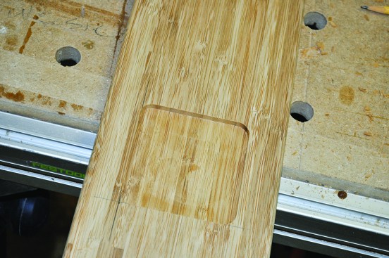 Figure 13. Router bits make radius corners. Square them with a chisel, or rout the same radius on the corners of the male piece, using a roundover bit. 