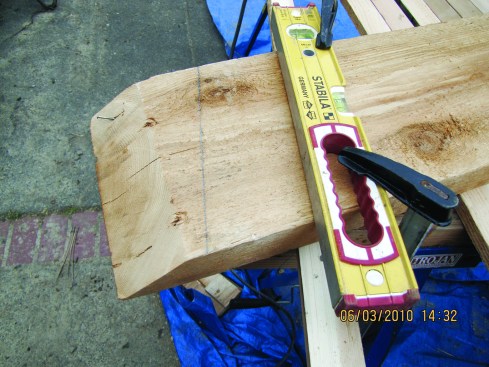 Figure 14. The simplest of router jigs can be a straightedge clamped to the workpiece. 