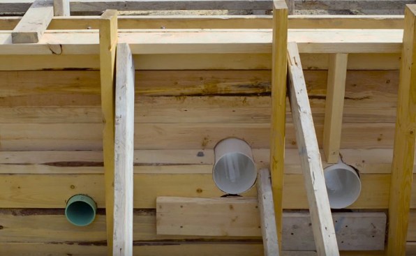 This gave us access to all the utilities under the house, by sleeving through the perimeter beam.