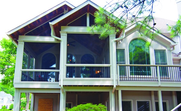 One way to blend a screen porch into the overall design of the home is to incorporate either front ...