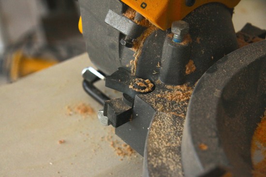 Adjustable positive stops for crown. Two pawls provide positive stops at 22.5 degrees and 33.9 degrees; they can be reversed for 45/45 crown. A chrome lever toward the back provides positive stop at 45 degrees and flips out of the way to achieve a sharper bevel.