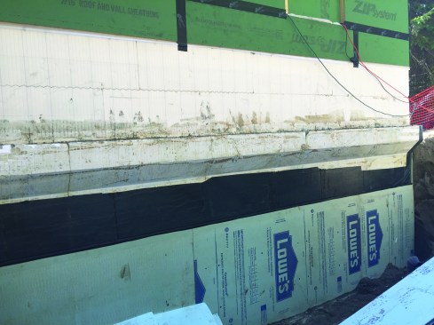 The foundation was formed out of ICFs , with an 8-inch ledge to support a full-depth veneer of stone siding/