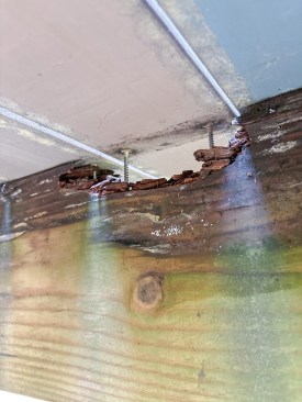 "Above Ground"-treated deck joist after 10 years