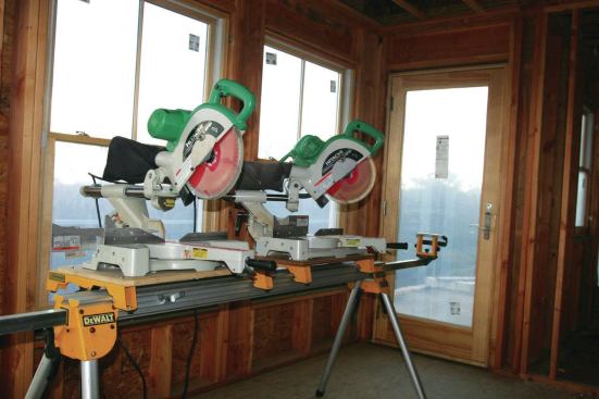 John Spier of Spier Construction, on Block Island, R.I., occasionally mount two saws on the sturdy main beam of the DeWalt stand so that they aren't constantly flipping stock end-for-end or tilting the saw from side to side when cutting lots of compound miters.