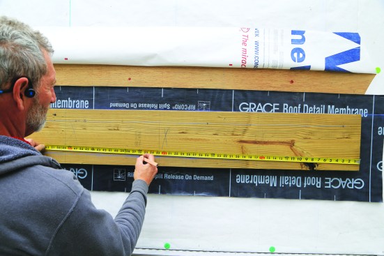 Fasteners are laid out on the ledger in two rows, starting approximately 3 inches in from one end, with the oncenter spacing from the code table staggered in a “W” pattern between the two rows.