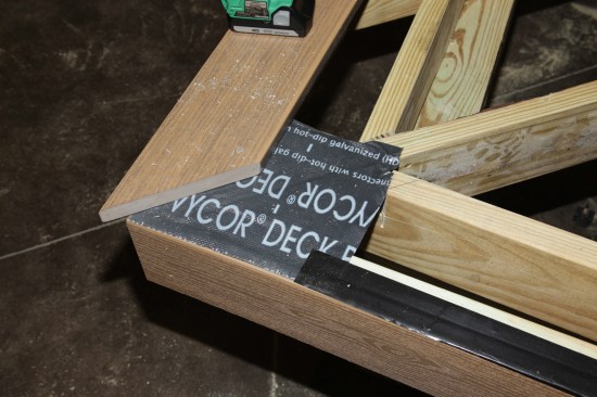 Many builders use self-adhesive membranes in various widths to protect deck framing from moisture. Here, narrow tape covers the gap between the fascia and rim, while wider pieces of membrane protect corners and doubled framing.