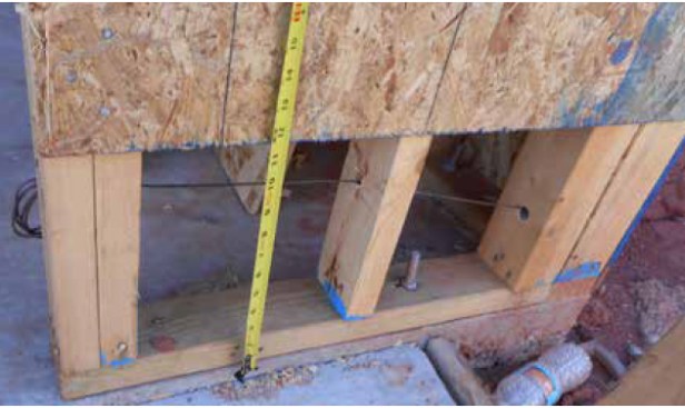 Making a panel joint near the bottom of the supporting wall weakens the wall’s resistance to shear.