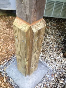 This UC4A-treated 6x6 southern pine post has been repaired using UC4B-treated 2x6 cleats and ¼-inch-by-3-inch structural fasteners. Note that the cleats as well as the concrete have been sloped to shed water.