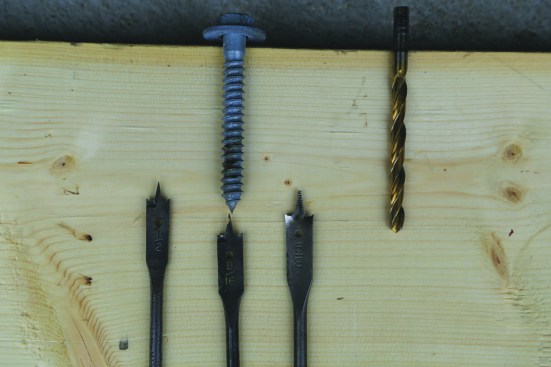 Clearance holes for 1/2-inch lag screws and bolts have a narrow range: 17/32 to 9/16 inch. A 1/2-inch drill bit is too small, and a 5/8-inch bit is too large.