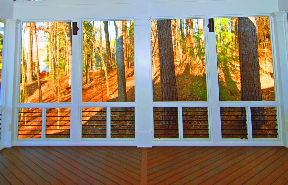 An open-style knee wall fitted with balusters offers enhanced views and ventilation.