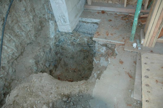 Pad footings. Dig the foundation where the columns’ hold-down anchors will be located. The minimum embed depth, the edge distance from the front and back of the footing, and the distance from the end of the footing to the centerline of the anchor are provided by the moment-frame manufacturer. However, the Engineer of Record may require larger footings. Digging the footing a little deeper not only ensures meeting code for moisture protection, it also makes installation of the moment frame and anchors in retrofit applications easier.