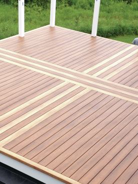 The contrasting color used for the design on the upper deck is echoed on the stairs and in the borders around the upper and lower decks.