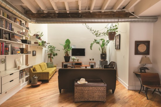 Remodeler Jerry Avellino removed an entire section of the third floor, installed skylights on top, and added a natural remote-operated vent chamber. Now, when the morning sun rises, sunshine dives deep into the two-story space, facing southeast, and provides illumination and ambient light.