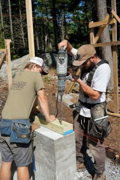 The crew places concrete and frames up stemwalls.