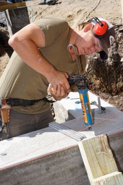 The crew places concrete and frames up stemwalls.