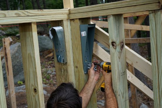 The crew places concrete and frames up stemwalls.