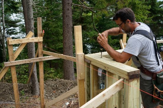 The crew places concrete and frames up stemwalls.