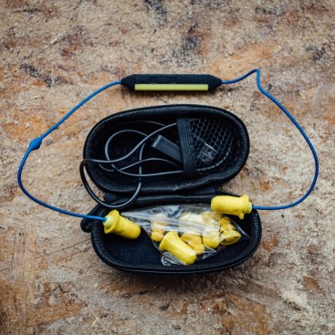 The PlugFones Liberte come with replaceable earplug tips of varying sizes and styles, as well as a case and charger. They sell for $99 online and are available in yellow/blue (shown here), gray/black and orange/blue.