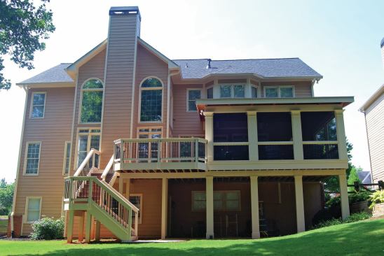 A shed style was the best solution for this porch roof because of restrictions placed by the existing second-story windows. It would also have been difficult to match the pitch of the existing gable roof next to the porch. 