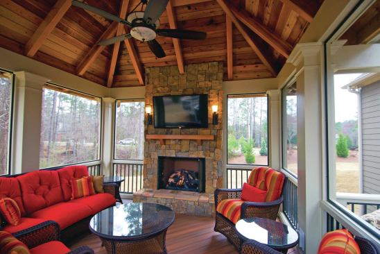 When well-executed, a hip roof on a detached porch can provide a dramatic vaulted ceiling.