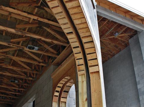 Framing must be planned to accommodate the guide tracks and motor housing for recessed motorized retractable screens.