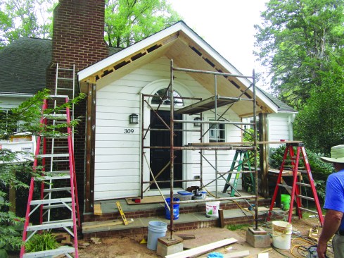 He blocked out the roof framing with 2x4s to provide nailing for the plywood ceiling.
