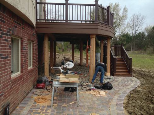Offcuts were used for the simple built-up trim applied to the bases and tops of the cedar-clad columns.